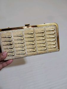 Gold Color Ka Bag Hai Yah Party Wear Ha