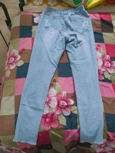 Ripped Light Blue Jeans