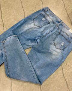 Light Blue Distressed Denim Jeans