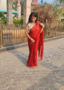 Elegant Red Saree with golden blouse