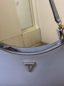 GUESS Women Solid Half Moon Fringed Shoulder bag