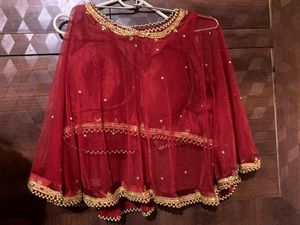 Red & Gold Embellished Blouse And Golden Skirt