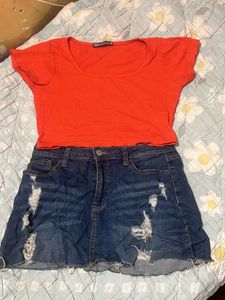 Orange Top & Distressed Denim Skirt