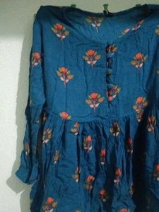 Tunics In Paplum Style