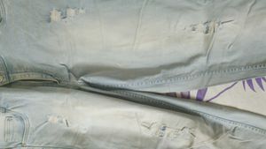 Ice Blue Colour Ripped Jeans