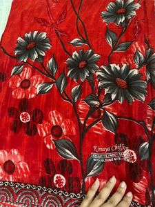 new red printed saree