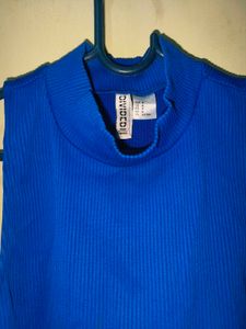 Blue Ribbed Mock Neck Crop Top