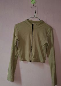 pastel green jacket top.