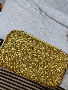 Price Dropped Golden Clutch Without Chain .