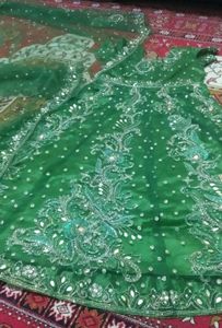 Parrot green Anarkali, chudidar n heavy duppata.