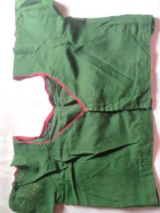 Green Blouse with Red Trim