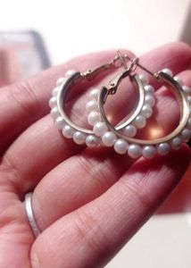 Round shape earrings with pearls