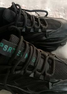 black chunky sole shoe