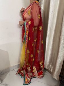 Stunning Red & Yellow Embroidered Net Saree