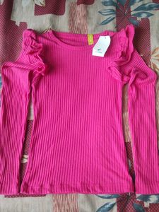 Pink solid ruffle top from Zudio