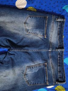 Distressed Denim Jeans