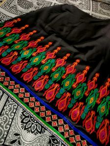 Elegant Black And Red Saree