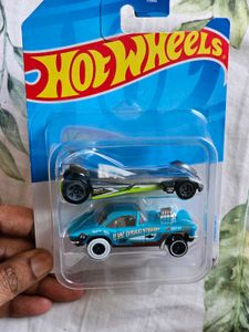 Two Hot Wheels cars, factory-sealed and brand new