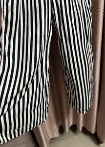 Bold Striped Jumpsuit with Statement Orange Detail