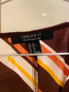 FOREVER 21 BODYSUIT IN M/L