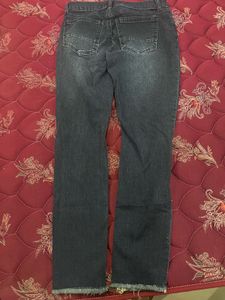 Ripped Dark Blue Jeans