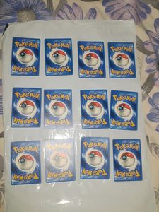 12 DIFFERENT PIKACHU ARTWORK POKEMON CARDS.