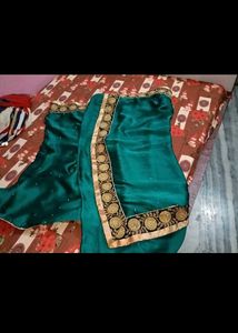 Elegant Green Saree with Gold Border