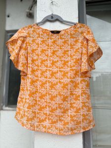 Zink Orange Floral Ruffle Top