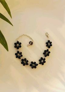 Two Bracelets And One Earrings