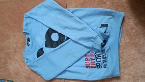 A Sky Blue Sweatershirt .