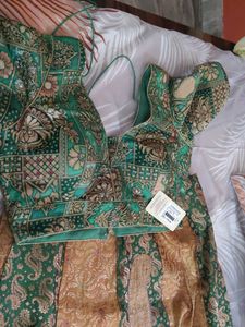 Embroidered Green and gold lehenga choli
