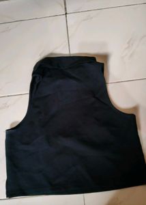 Black Sleeveless Turtleneck Top