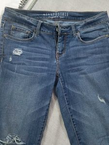 Distressed Denim Jeans