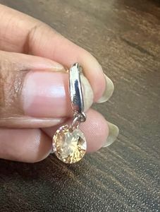 Silver drop earrings with a stone