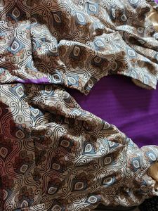 Saree With Peacock Feather Design