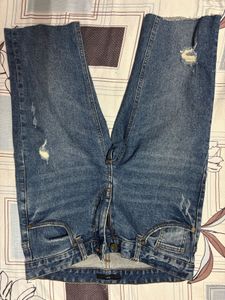 Ripped Blue Denim Jeans