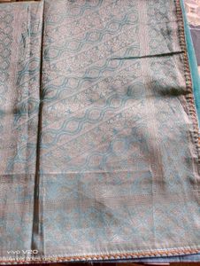 Elegant Aqua Saree with Intricate Paisley Detail