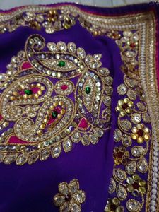 A Purple Blue Saree With Heavy Work
