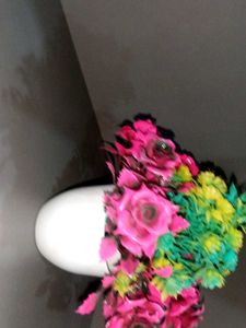 Floral arrangement with pink roses