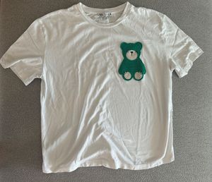 White Tee with Green Crochet Bear