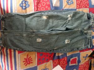 Ripped Blue Denim Jeans