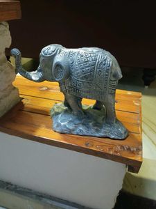 white metal elephant figurine.