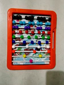 Kids Writing Slate With Abacus Behind