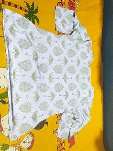 Front Knot Short Kurti Top With 3/4 Sleeves.