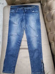 Distressed Denim Jeans