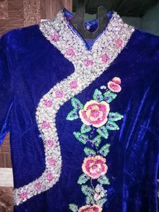 beautiful blue velvet dress knows as Chinese dres
