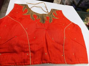 Orange Colour Blouse With Sleeves Inside...