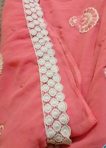Coral Lace Trimmed Fabric