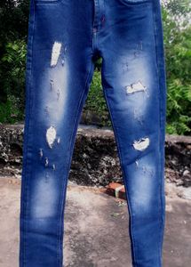 Ripped Blue Denim Jeans