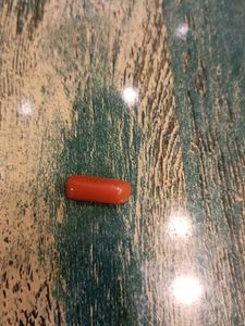 Red Bullet-Shaped Trinket
